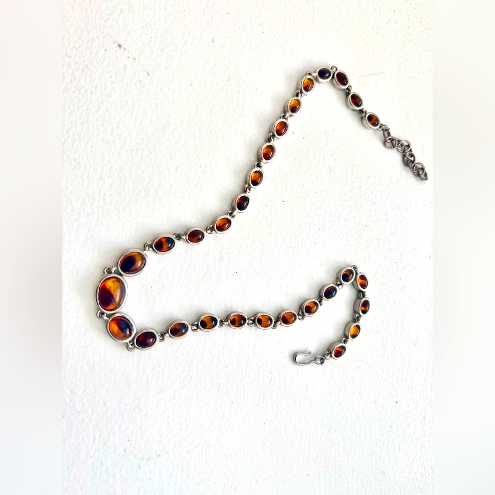 Authentic Amber and Sterling Silver necklace. Great condition. Worn once.